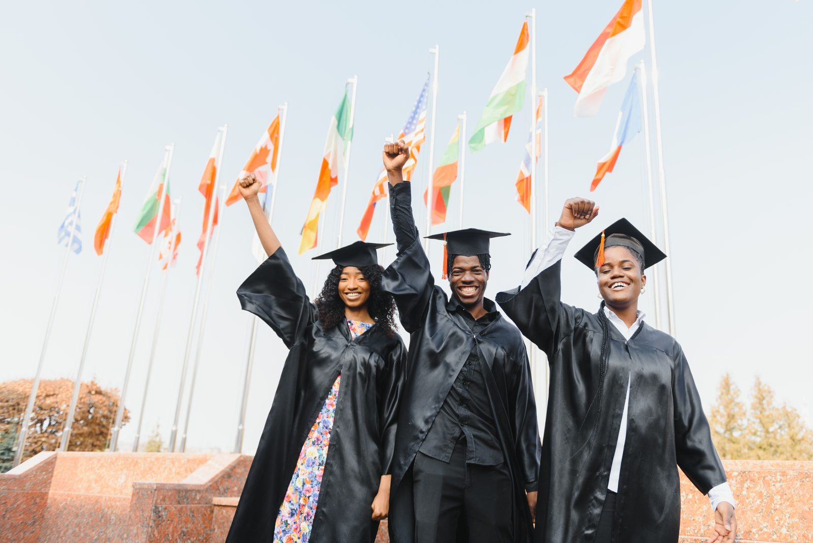 Excited African graduates celebrating on graduation day
