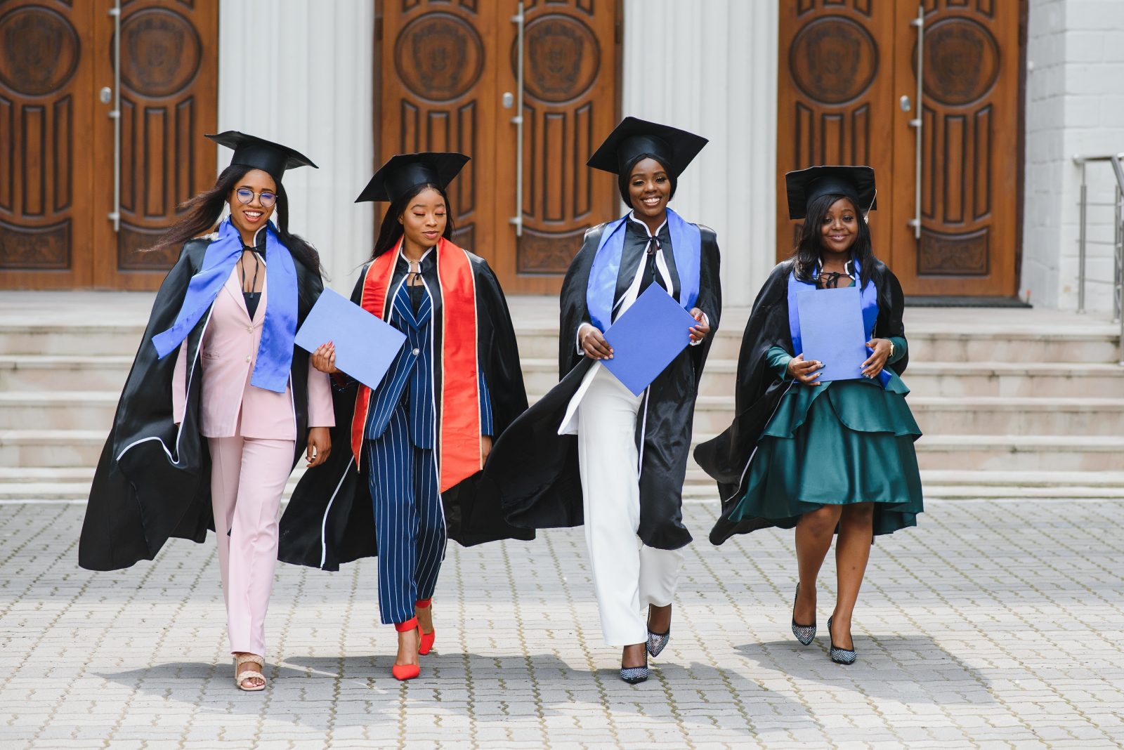 Young women celebrating their academic achievement on graduation day